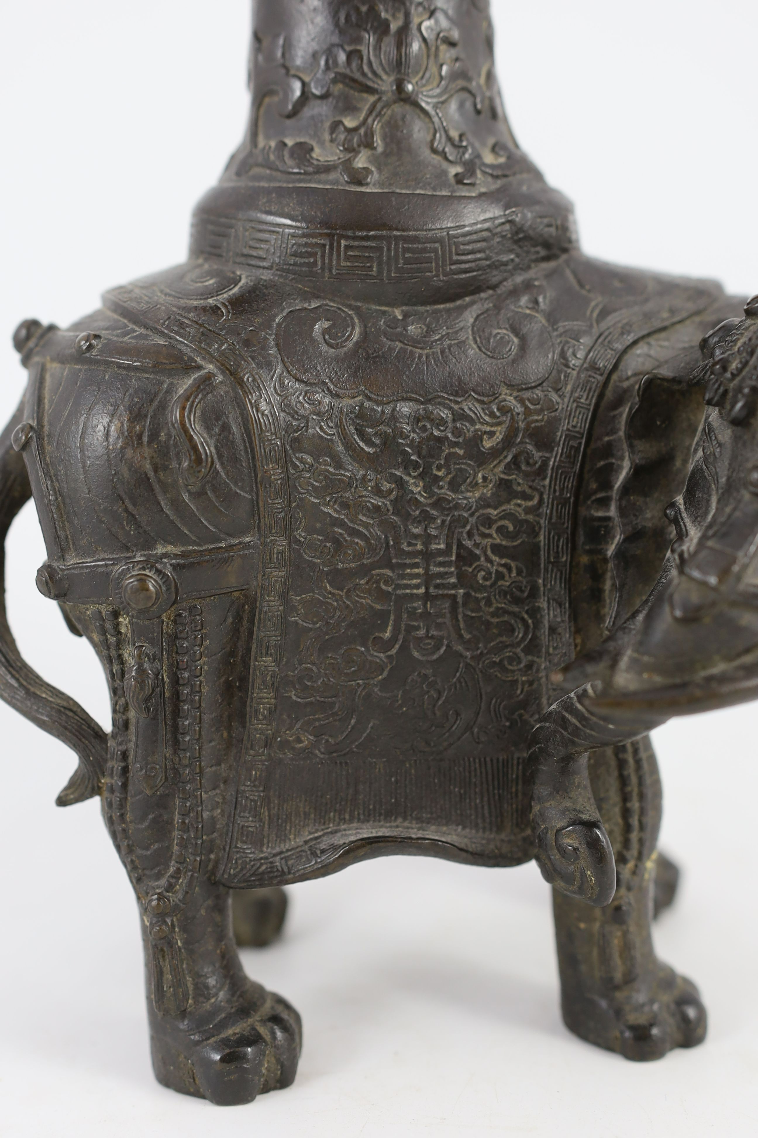 A Chinese bronze ‘elephant’ vessel, late Ming dynasty, 36cm high, Repairs